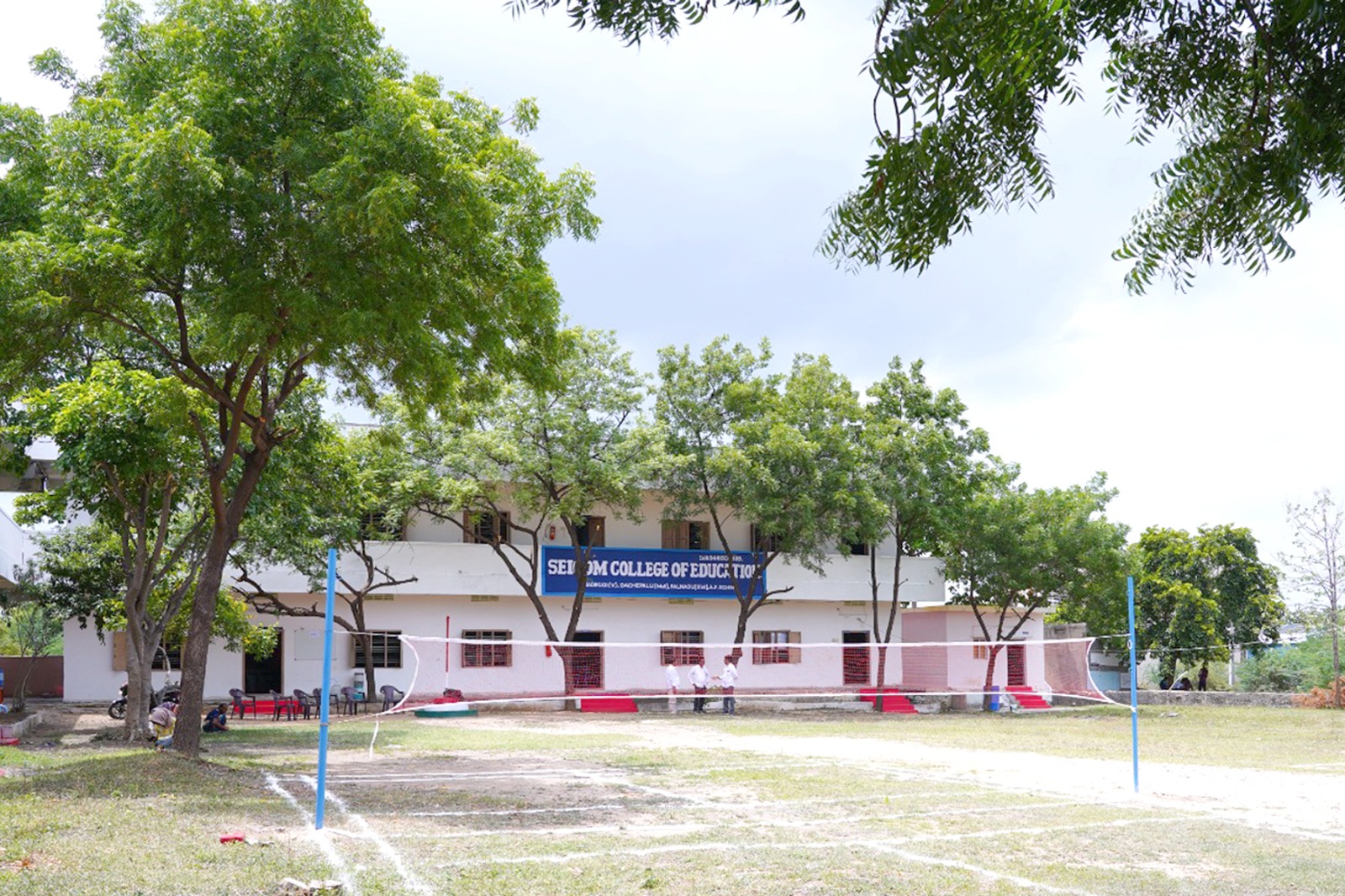 SEICOM college campus and outdoor sports area with a volleyball net